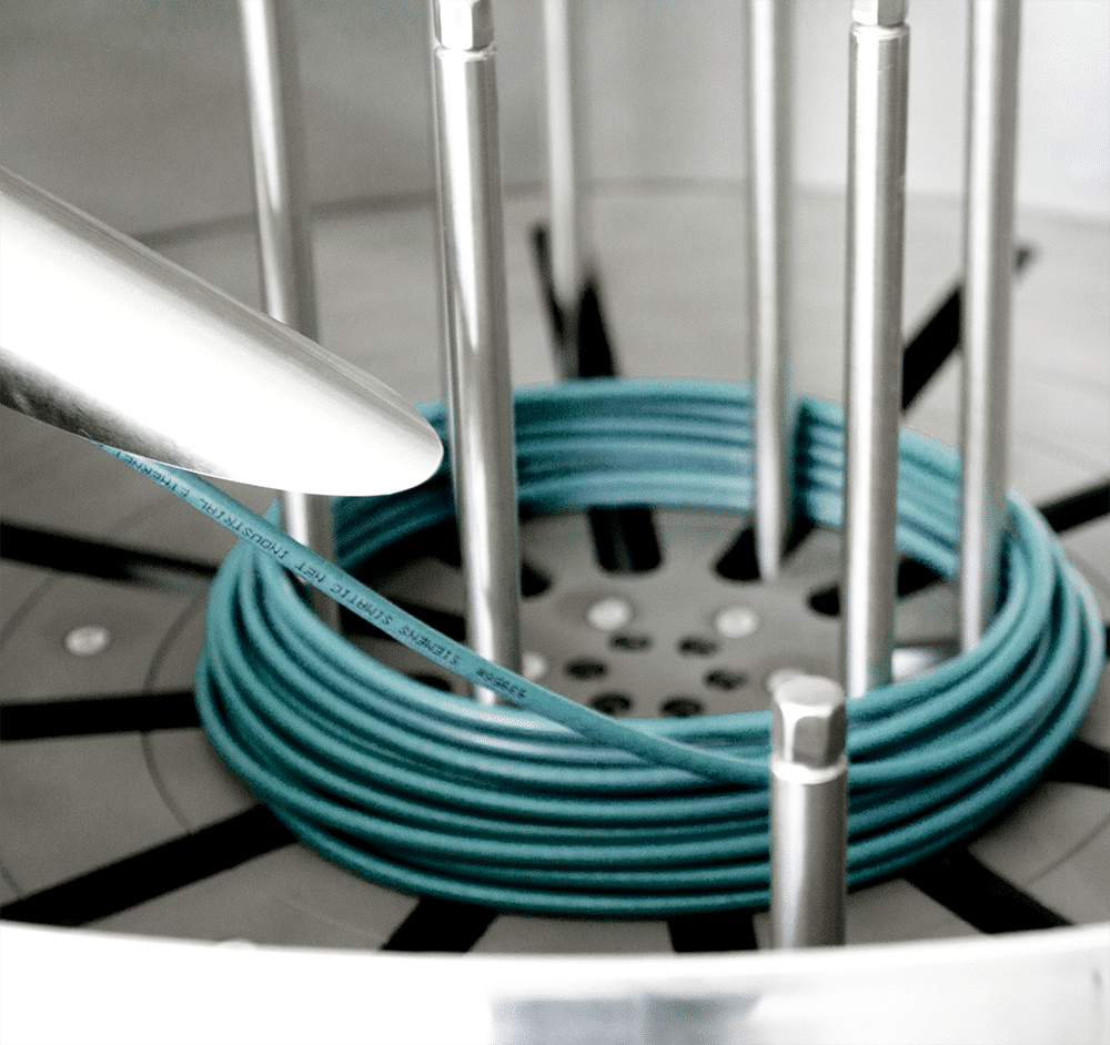 Cable coiler coils the printed cable