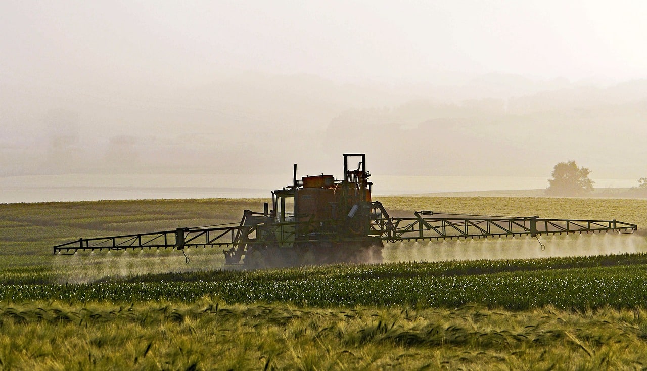 Tractor with agricultural equipment